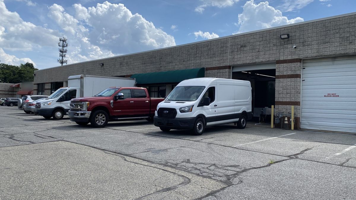 Enlightened Audiovisual shop and warehouse with the company service van