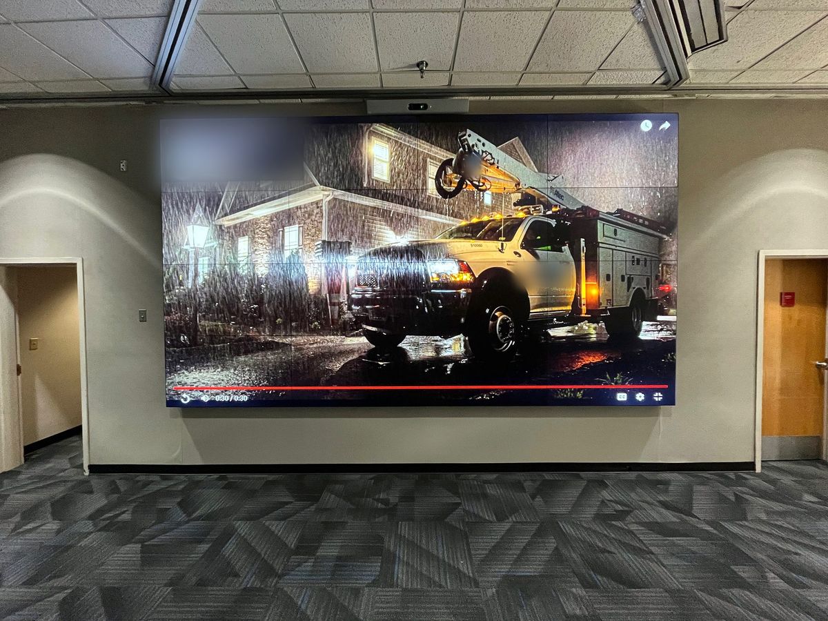 Large seamless lobby video wall playing high-definition video, installed by Enlightened Audiovisual